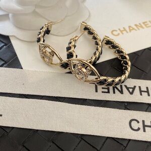 CHANEL Gold and Black Hoop Earrings